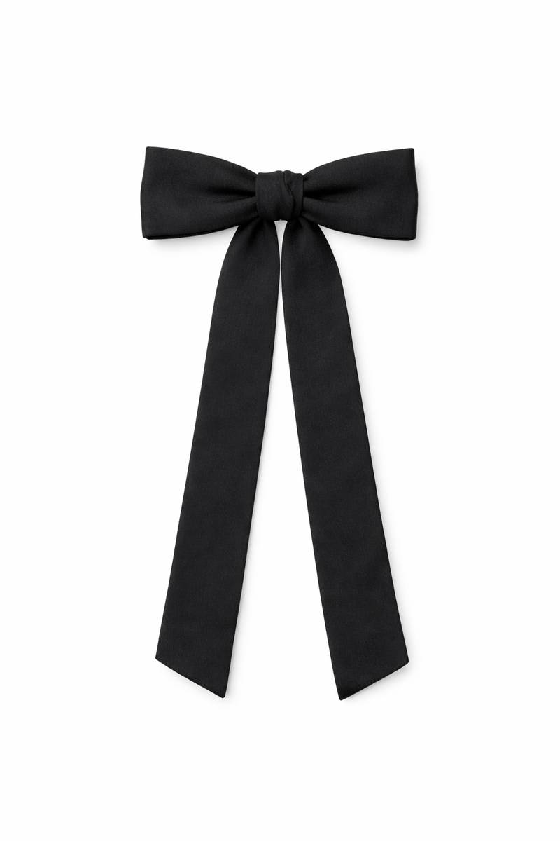 Gently used black western bow tie with adjustable hook closure. Pre-tied for instant wear.
