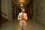 Two-piece Men's Tan Slim Fit Suit, crafted for the modern professional who demands both style and substance, and the included complimentary dress shirt ensures you're fully equipped for any formal occasion.  