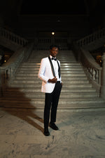 Men's White Slim Fit Tuxedo Jacket & Black Pants. Men's black shawl collar white tuxedo jacket and black slim fit suit pant with performance stretch, delivering comfort and mobility without sacrificing form. The included dress shirt provides everything needed for polished, head-to-toe sophistication at any event.